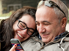 A couple enjoying time together, wearing glasses